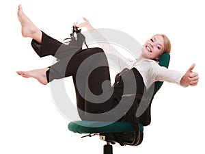 Break from work. Businesswoman relaxing on chair.