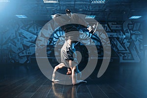 Breakdance motions, performer in dance studio photo