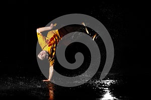 Breakdance style dancer in water photo