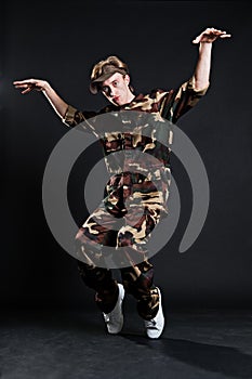 Breakdancer in military uniform