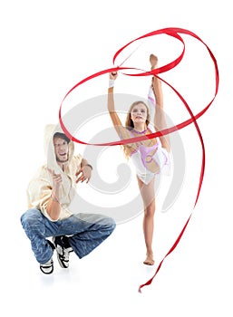 Breakdancer squats and hamming and graceful gymnast girl