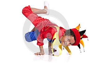 Breakdancing boy dressed in clown costume