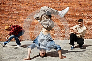 Breakdancing Crew doing Stunts Outdoors