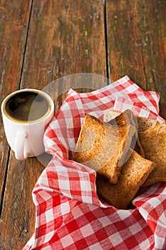 Breakfast background, toast and coffee on rustic wood