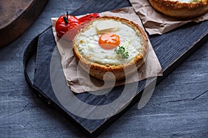 Breakfast with baked cheese and egg yolk filled buns