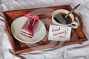 Breakfast in bed. Cup, coffee, red, velvet, cake and note with t