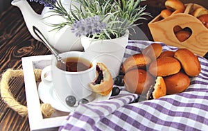 Breakfast in bed with fresh buns photo