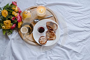 Breakfast in bed. Homeliness. Lemon tea close-up