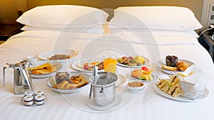 Breakfast in bed in hotel. Room service in modern luxury resort