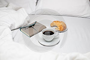 Breakfast in bed and time for writing in a diary