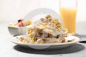 Breakfast Bendict with Orange Juice and Fresh Fruit