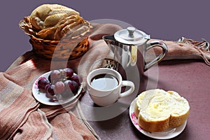 Breakfast in Brazil. Coffee, bread and butter and grappes