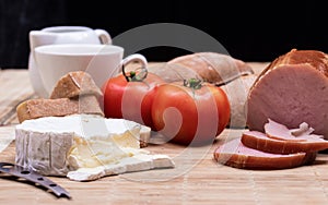 Breakfast with bread rolls and blu cheese