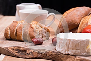 Breakfast with bread rolls and blu cheese