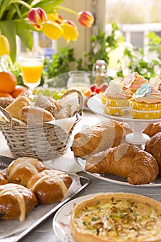 Table with delicatessen ready for Easter brunch