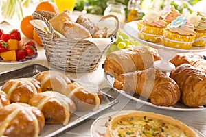 Table with delicatessen ready for Easter brunch photo