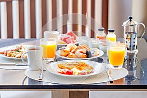 Breakfast Buffet in Luxury Hotel, Omelette and Fresh Desserts, Buns, Croissant