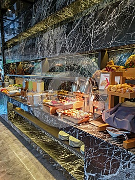 Breakfast buffet in luxury hotel in Thailand, fresh fruit and bread at buffet styl breakfast in hotel