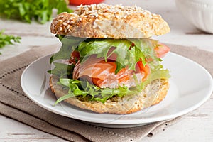 Breakfast - burger with smoked salmon, vegetables