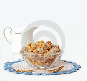 Breakfast Cereal in a Glass Bowl and a Vintage Cream Pitcher Iso