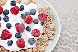 Breakfast cereal with raspberries & blueberries