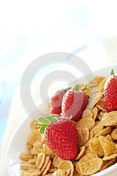 Breakfast cereal with strawberries and cream