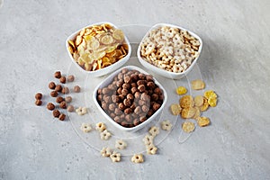 Breakfast cereals in bowls on a light background