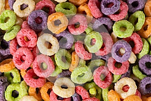 Breakfast cereals.Colorful corn rings background texture