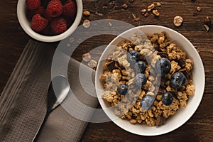 Breakfast with cereals and raspberries