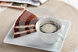 Breakfast with chocolate cake and coffee