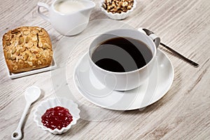 Breakfast with coffee, bread and jam