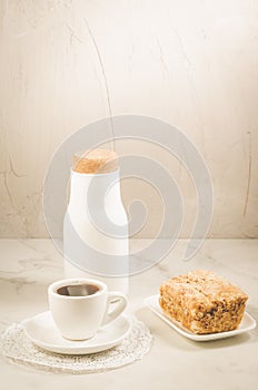 Breakfast with coffee and a dessert/breakfast with coffee and a dessert on a white table. Selective focus