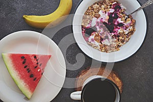 Breakfast with coffee and fruits