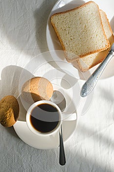 Breakfast with coffee, sweets and toast