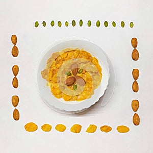 Breakfast cornflakes badam almond milk pumpkin seeds dry fruit
