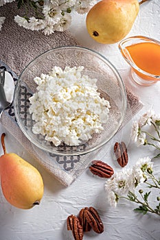 Breakfast of cottage cheese, pear and jam