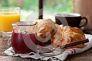 Breakfast With Croissants and Strawberry Preserves