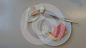 Breakfast with egg an bread roll with salami