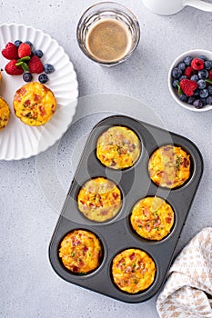 Breakfast egg muffins or egg bites with bacon and cheddar