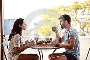 Breakfast food, home and couple argue, fight or angry over relationship problem, mistake or frustrated on apartment