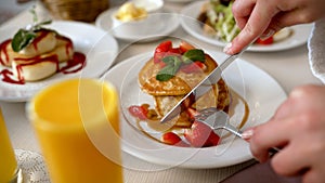 Breakfast food at the hotel on a tray. Breakfast in a hotel room, close-up.