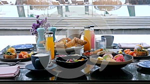 Breakfast with Fresh Food in Luxury Hotel. Morning Food with Eggs Benedict