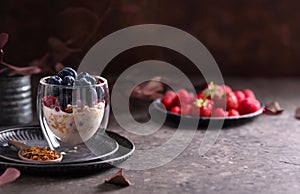 breakfast in a glass granola yogurt and berries