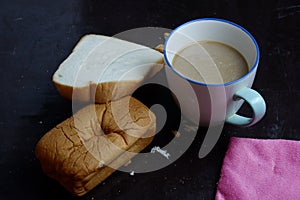 Breakfast hot coffee and bread background