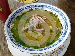 Breakfast meal fish soup with onion