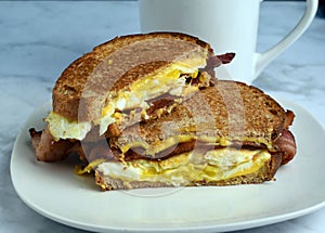 fried egg bacon breakfast melt sandwich