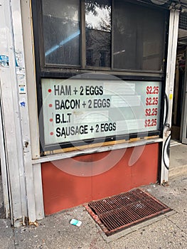 Breakfast menu at deli window in New York City