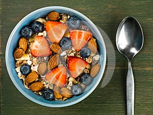 Breakfast Muesli Cereals With Strawberries and Blueberries Fruit