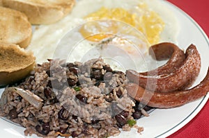 Breakfast in Nicaragua gallo pinto eggs sausage photo