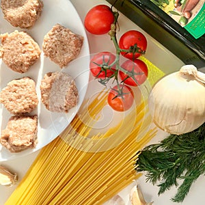 Breakfast onion and pasta  spaghetti, tomato, meatballs